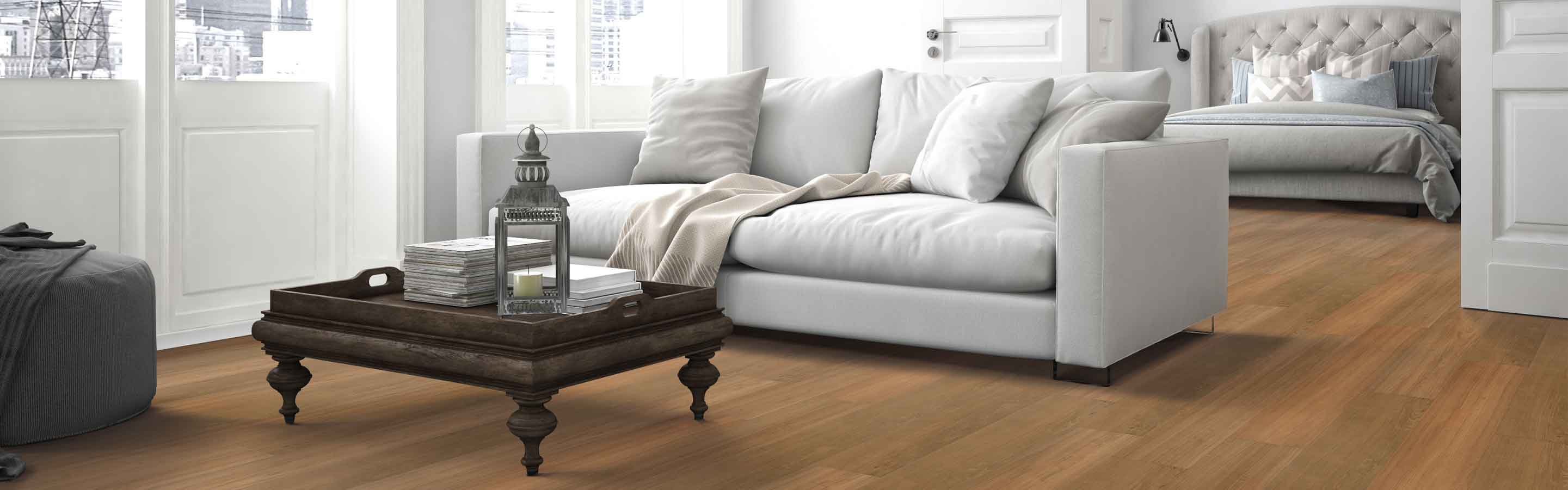 vinyl plank floors in a living room and bedroom